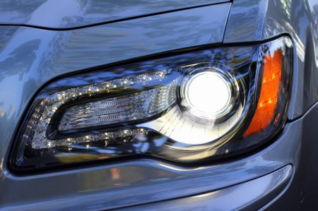 Headlight detail of 2012 Chrysler 300 SRT8