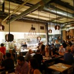 Formerly an old warehouse, the dining room is designed with Edison lightbulb fixtures at Bestia restaurant in downtown Los Angeles, CA
