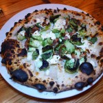 The guanciale pizza at Bestia has house-made Italian bacon, ricotta and Brussels sprouts