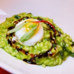 Asparagus risotto topped with quail eggs and balsamic reduction at Sirio Ristorante