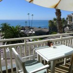 Outdoor dining with ocean views at The Loft at Montage Laguna Beach