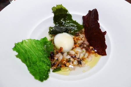 Brassicas with toasted grains and wild seaweed comprises this dish at Saison in San Francisco, CA.