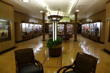 Take a seat in the lobby or browse the gift shops on The Queen Mary